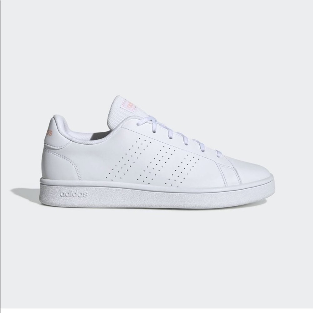 Adidas Advantage with coral-dust pink lettering.